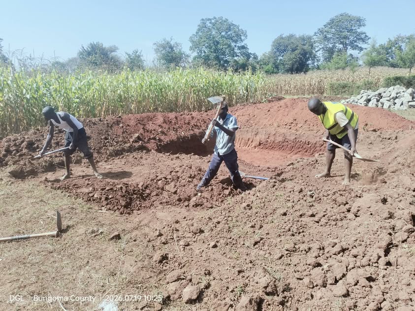 Construction team carrying out excavation work in Bungoma County