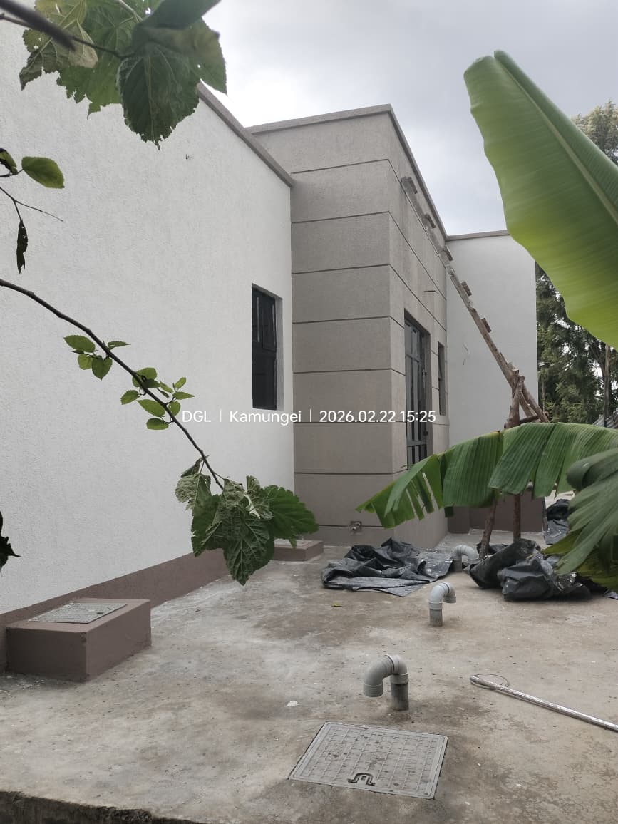 Side elevation and service area of the completed Nakuru bungalow
